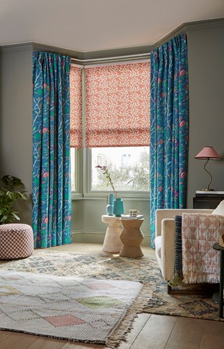 Arena Tree of Life Curtains & Molly Coral Roller Blind in a living room room set